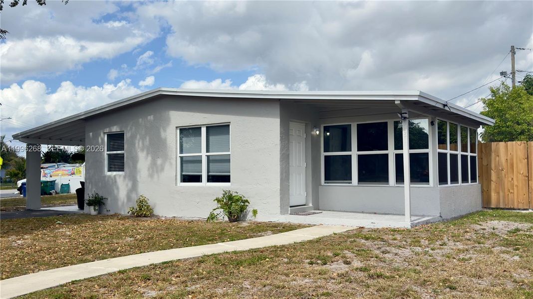 Exterior details and patio area of a home in , Lauderhill (Image 1). Exterior details and patio area of a home in , Lauderhill (Image 1).