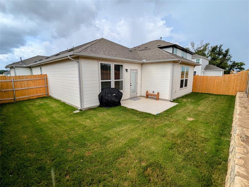 Private fenced Backyard