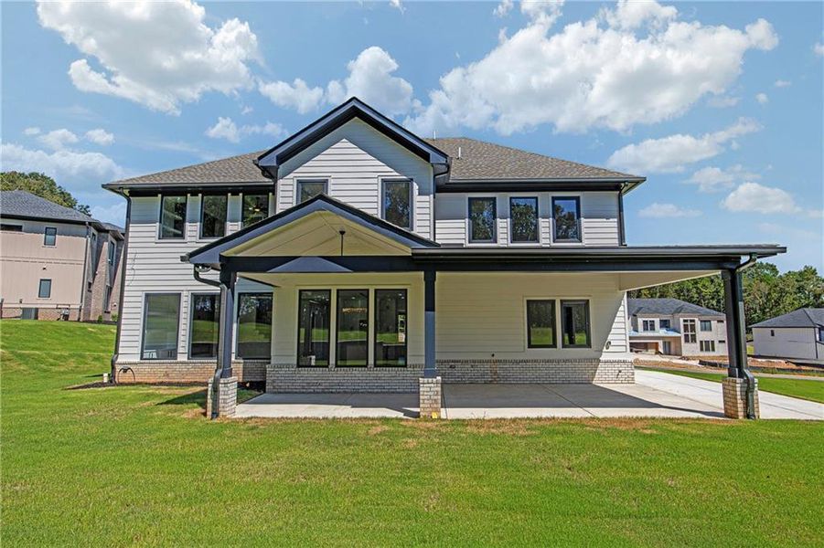 Front exterior of a new home in , Auburn, GA, highlighting curb appeal (Image 26).
