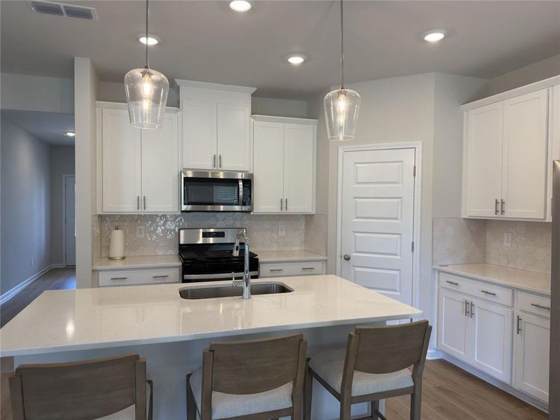 Furnished interior view inside a new home in Martin Springs - Estate Series, Lawrenceville (Image 4).
