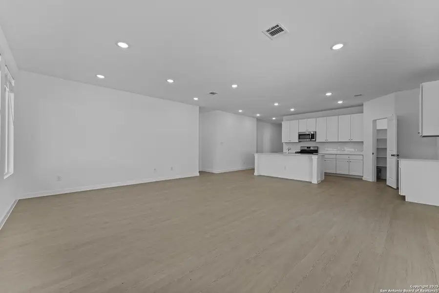 Spacious, unfurnished interior of a new home in Waterwheel: Coastline Collection, San Antonio (Image 10).