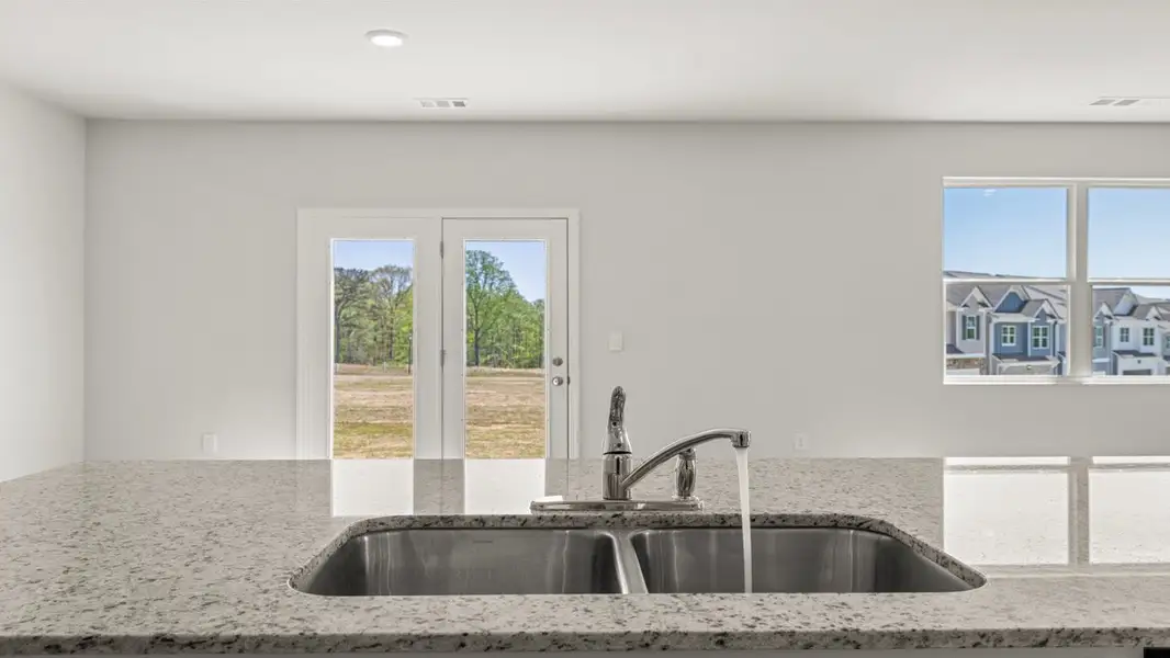 Representative furnished interior of a home built from the Aisle by D.R. Horton in Rolling Meadows, Jasper (Image 9).