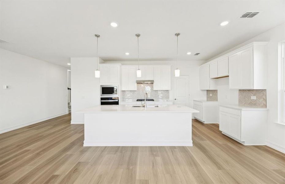 Airy kitchen with ample cabinet space