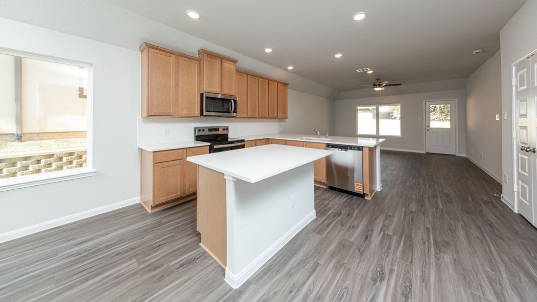 Dining Area to Kitchen and Family Room