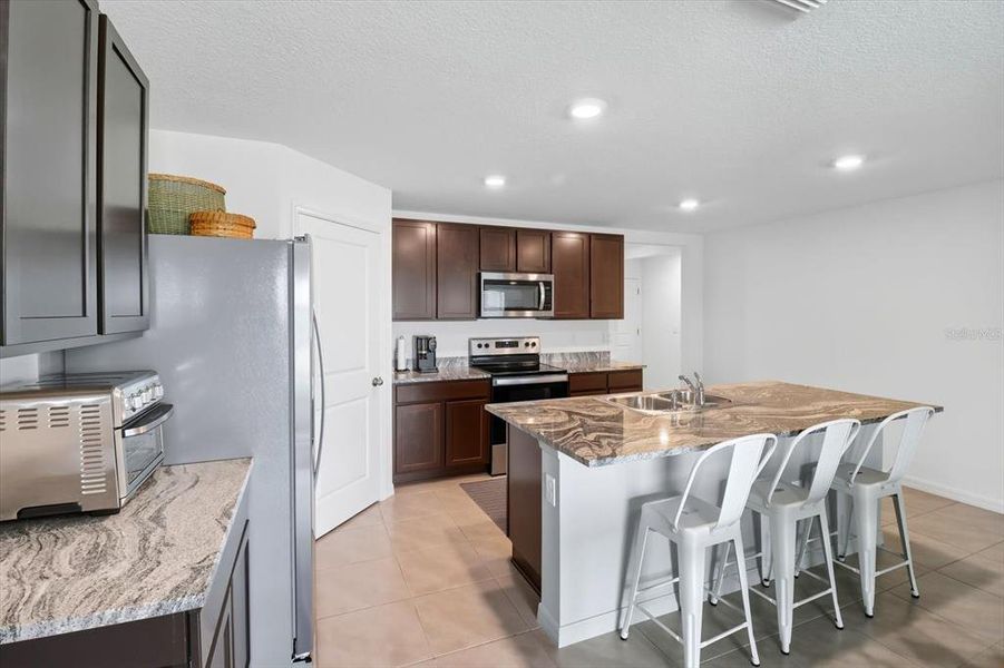 Furnished interior view inside a new home in Fairways at Twisted Oaks, Beverly Hills (Image 5).