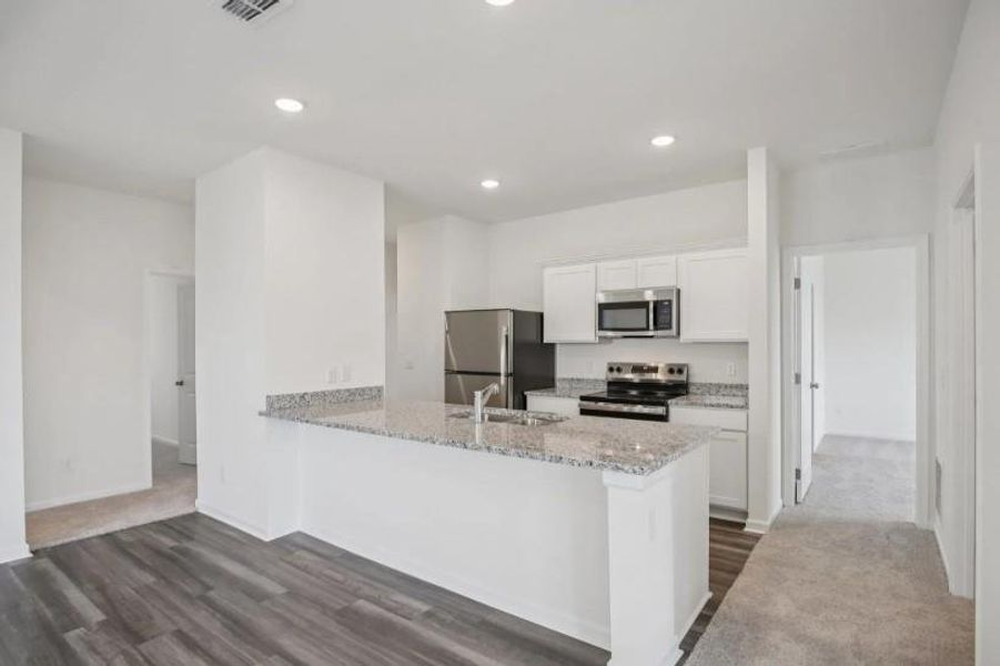 Furnished interior view inside a new home in Crescent Pointe, Carrollton (Image 7).