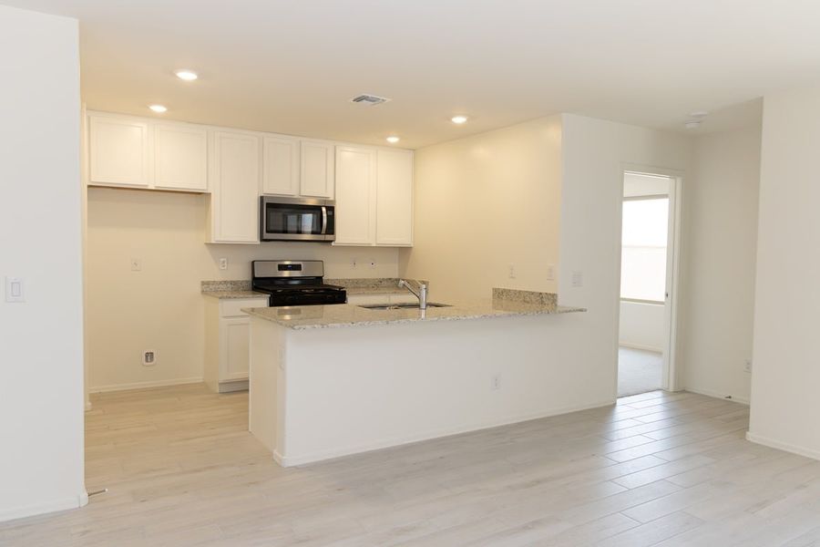 Furnished interior view inside a new home in Vista Del Oro Reserve, Tucson (Image 3). Furnished interior view inside a new home in Vista Del Oro Reserve, Tucson (Image 3).