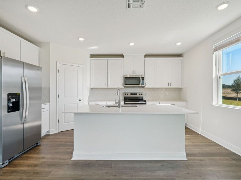 Furnished interior view inside a new home in The Reserve at Twin Lakes, St. Cloud (Image 3).