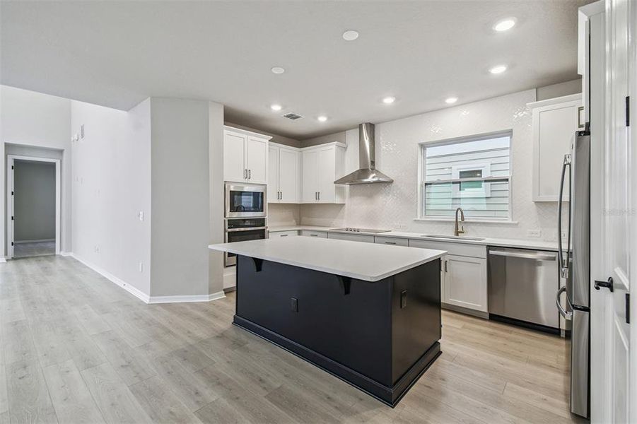 Furnished interior view inside a new home in Weslyn Park in Sunbridge 34', St. Cloud (Image 11).