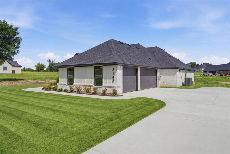 Front exterior of a new home in , Weatherford, TX, highlighting curb appeal (Image 2). Front exterior of a new home in , Weatherford, TX, highlighting curb appeal (Image 2).