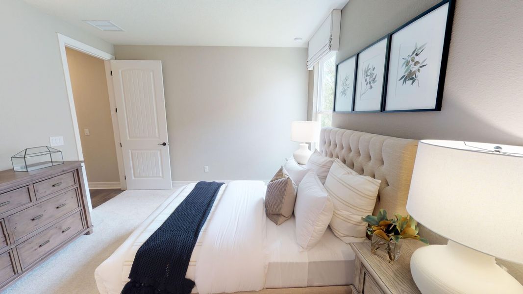 Representative furnished interior of a home built from the Renown by DiVosta in Talon Preserve on Palmer Ranch, Nokomis (Image 26).