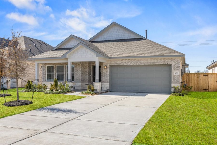 Front exterior of a new home in Ashland, Houston, TX, highlighting curb appeal (Image 23).