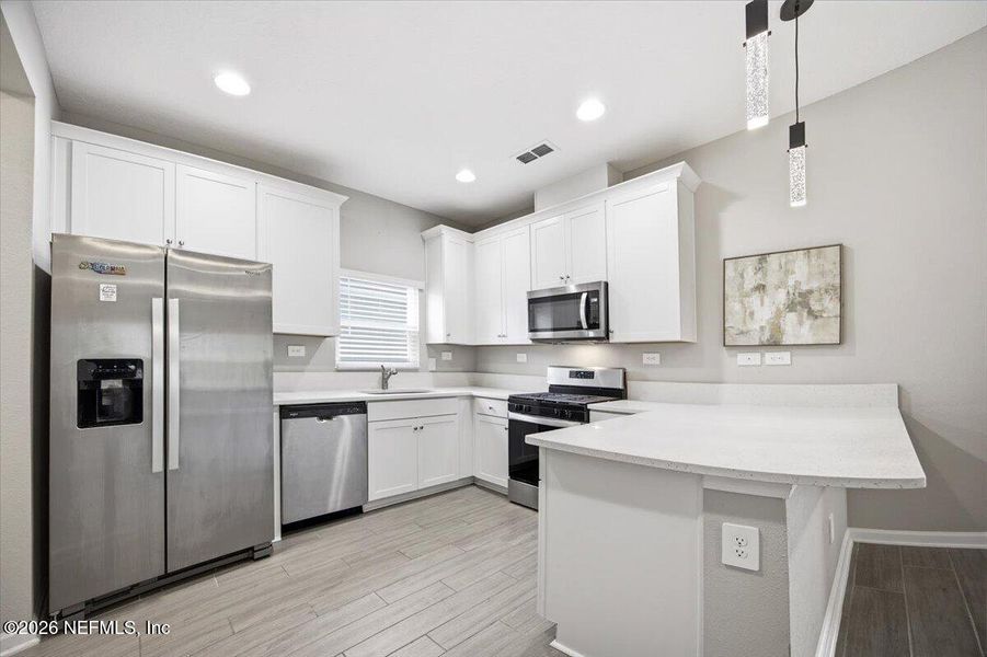 Furnished interior view inside a new home in Cordova Palms, St. Augustine (Image 5).