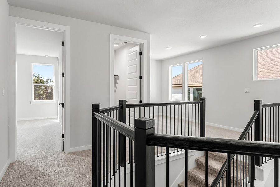 Furnished interior view inside a new home in Terrace Collection at Lariat, Liberty Hill (Image 14). Furnished interior view inside a new home in Terrace Collection at Lariat, Liberty Hill (Image 14).