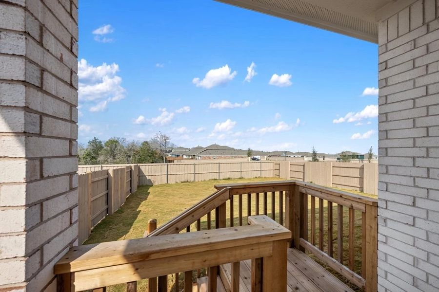 Exterior details and patio area of a home in The Colony, Bastrop (Image 24).