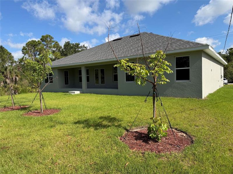 Exterior details and patio area of a home in Port Charlotte, Port Charlotte (Image 11).