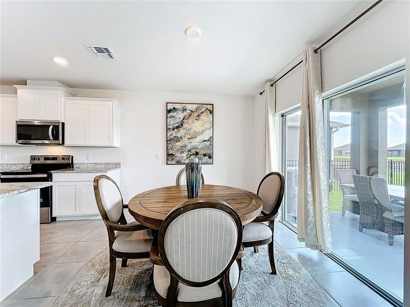 Furnished interior view inside a new home in Cypress Bay West, Palm Bay (Image 33).