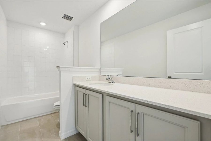 Furnished interior view inside a new home in Ardisia Park, New Smyrna Beach (Image 9).