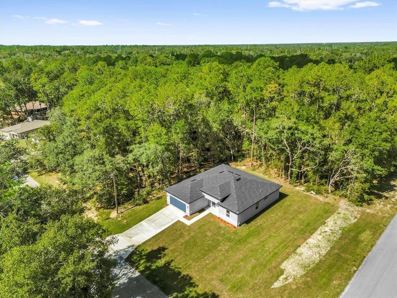 Front exterior of a new home in , Citrus Springs, FL, highlighting curb appeal (Image 20).