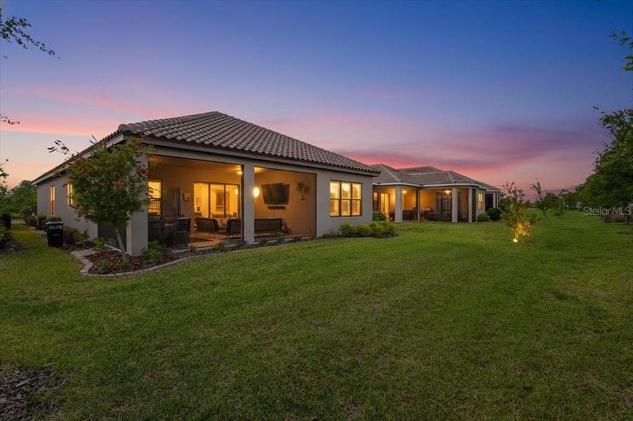 Exterior details and patio area of a home in Esplanade at Artisan Lakes, Palmetto (Image 24).