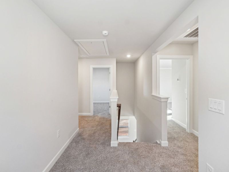 The upstairs loft conveniently leads to the Finley's three bedrooms.