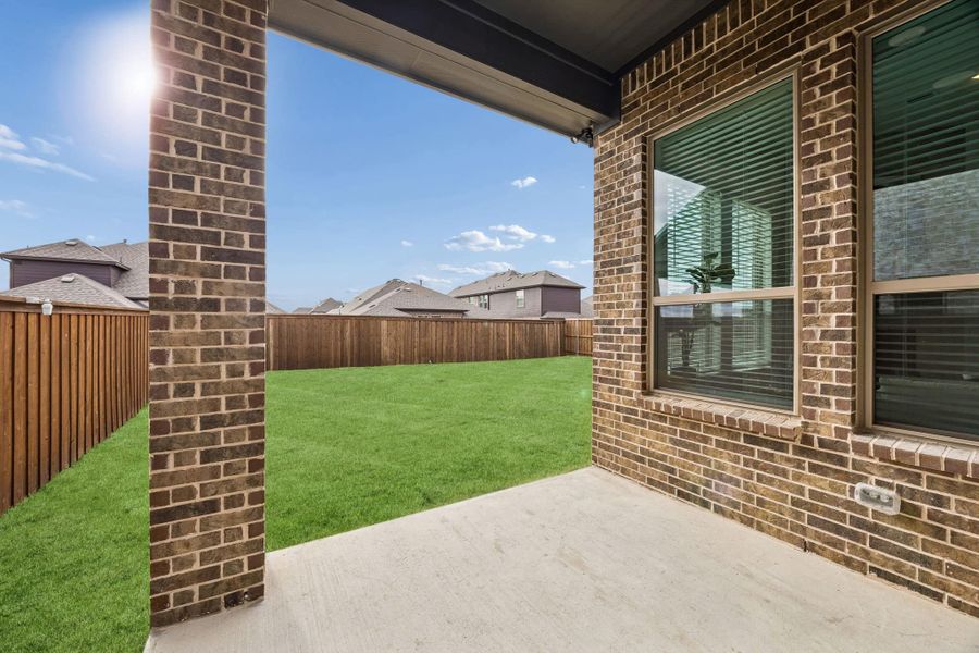 Exterior details and patio area of a home in Las Lomas, Forney (Image 4).