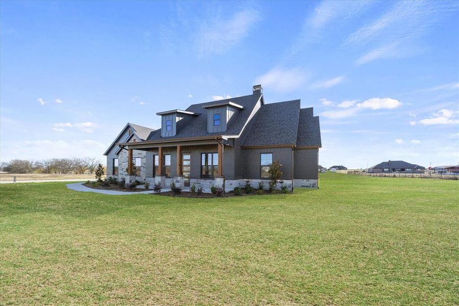 Front exterior of a new home in , Caddo Mills, TX, highlighting curb appeal (Image 6).