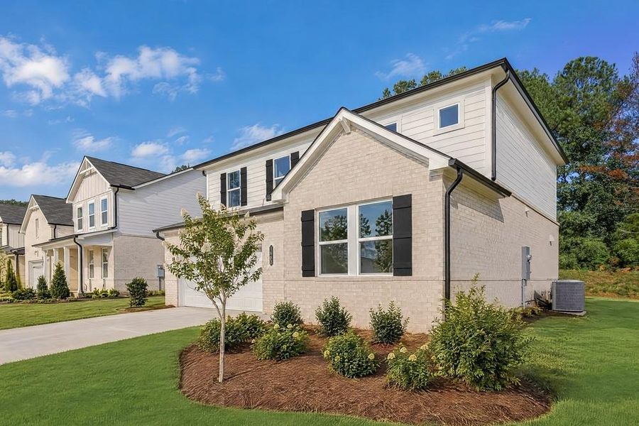 Front exterior of a new home in Windance Lake, Loganville, GA, highlighting curb appeal (Image 2). Front exterior of a new home in Windance Lake, Loganville, GA, highlighting curb appeal (Image 2).