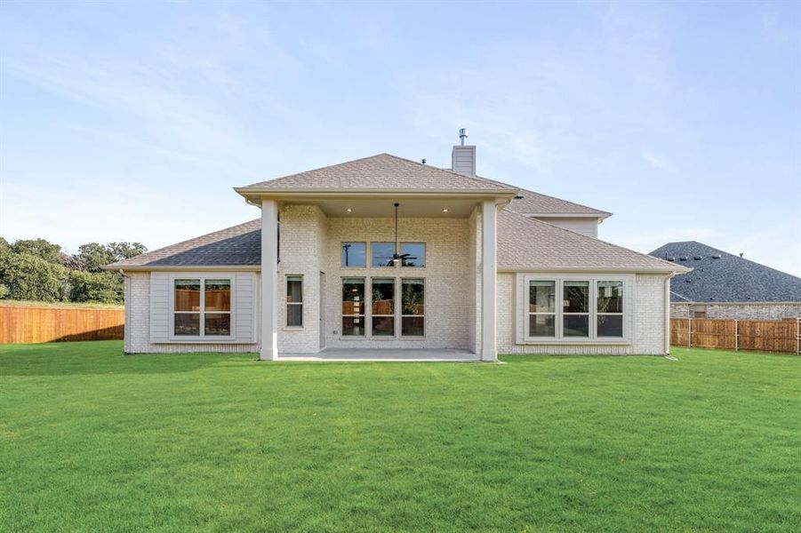 Front exterior of a new home in Rockwood 90, Mansfield, TX, highlighting curb appeal (Image 24). Front exterior of a new home in Rockwood 90, Mansfield, TX, highlighting curb appeal (Image 24).