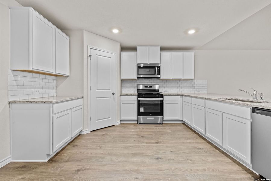 Furnished interior view inside a new home in Redbird Ranch, San Antonio (Image 5).