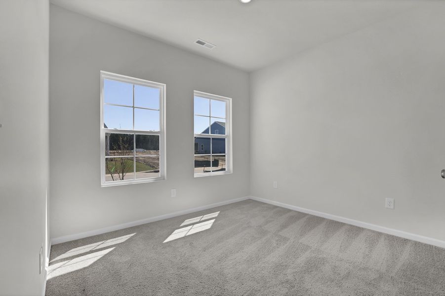 Spacious, unfurnished interior of a new home in River Tide Farms, Bolivia (Image 20).