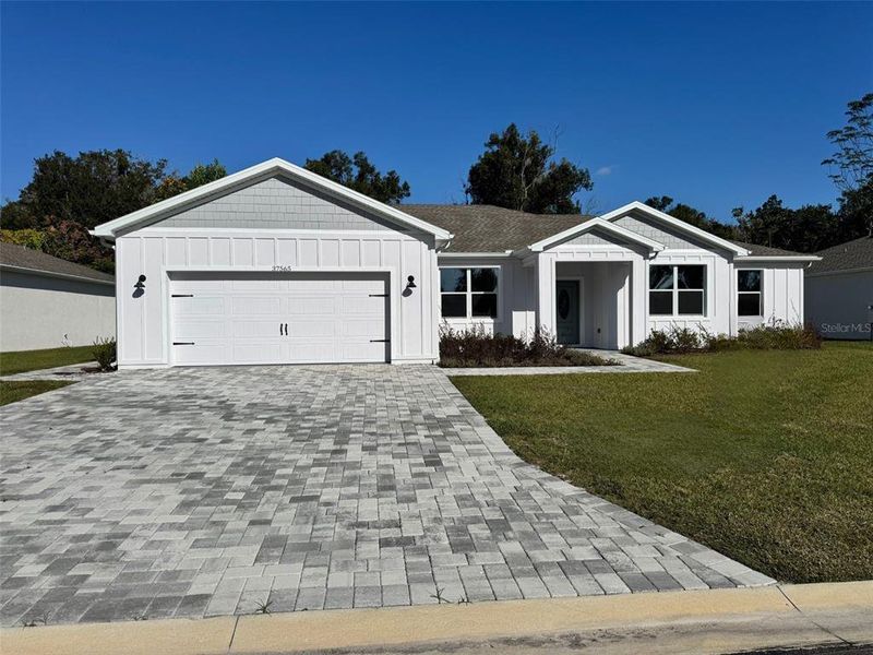 Front exterior of a new home in , Dade City, FL, highlighting curb appeal (Image 2).