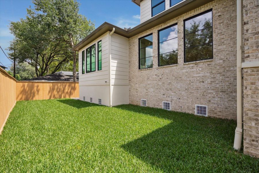 Exterior details and patio area of a home in , Houston (Image 3).
