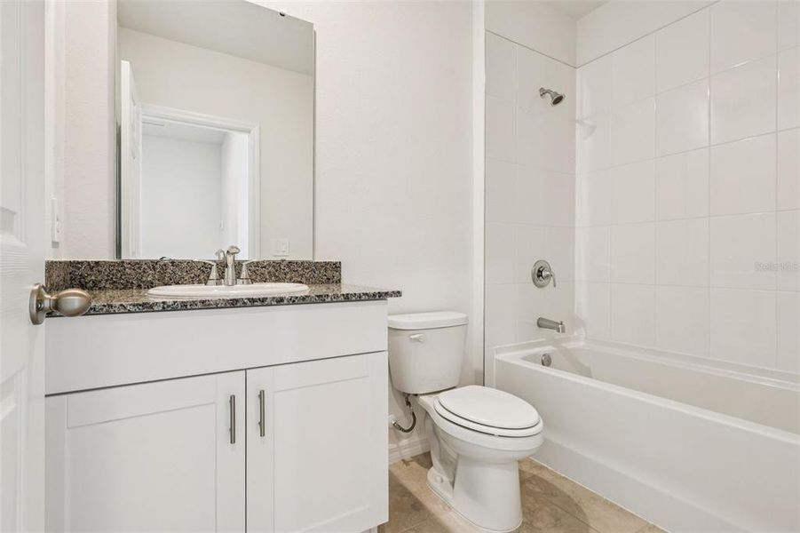 Furnished interior view inside a new home in Bradbury Creek - Classic Series, Haines City (Image 11).