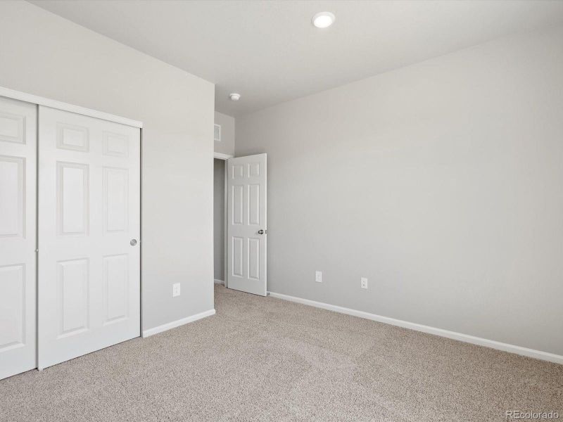 Spacious, unfurnished interior of a new home in Poudre Heights: The Alpine Collection, Windsor (Image 32).