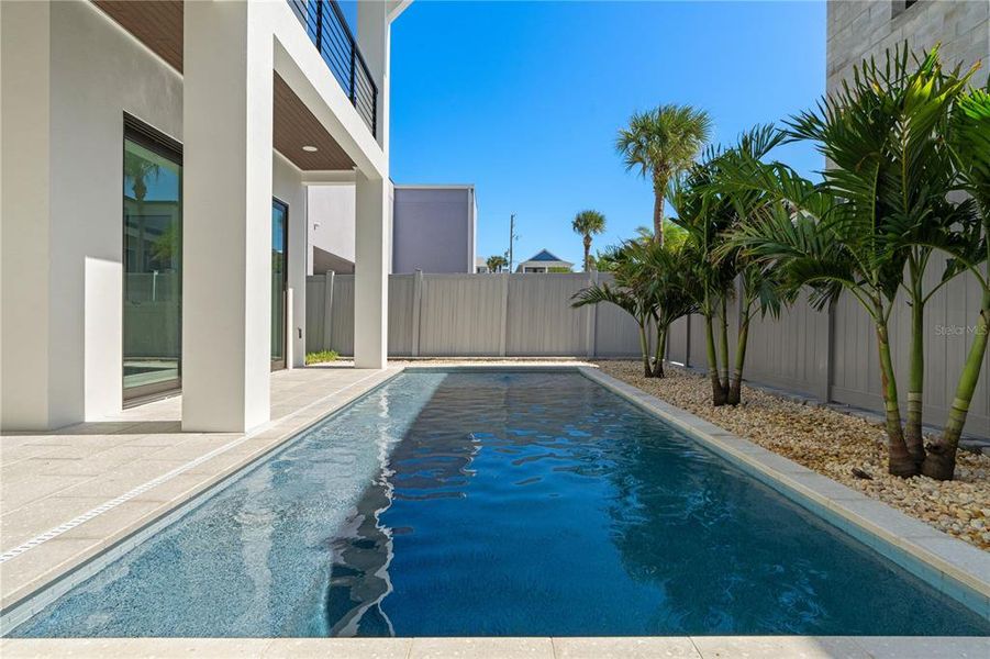 Exterior details and patio area of a home in , New Smyrna Beach (Image 45).