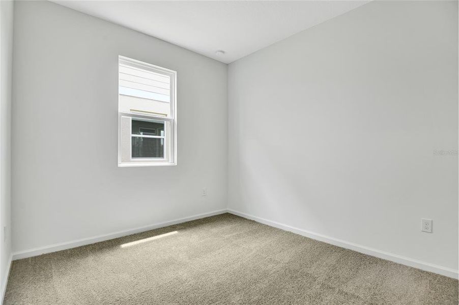 Spacious, unfurnished interior of a new home in Seasons at Shores of Lake Dell, Dundee (Image 15).