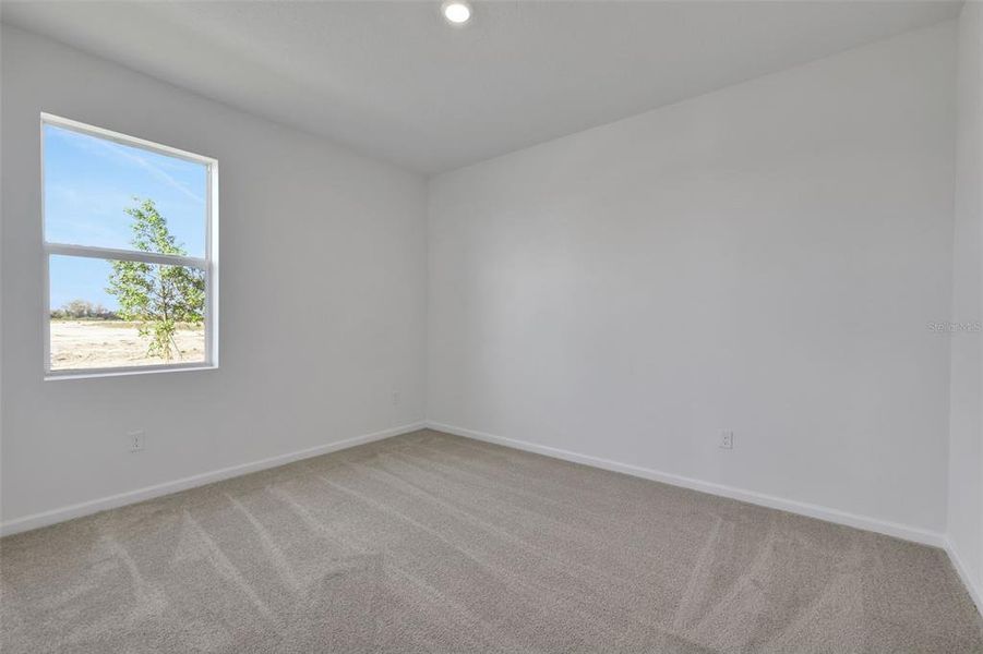 Spacious, unfurnished interior of a new home in Brystol North at Wylder, Port St. Lucie (Image 18).