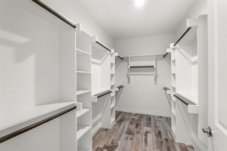 Walk in closet off primary bathroom Walk in closet off primary bathroom