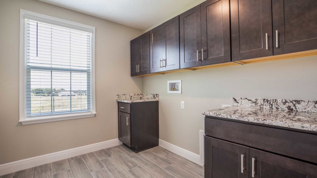 Representative furnished interior of a home built from the Columbus by Maronda Homes in Bella Estates, Plant City (Image 10).