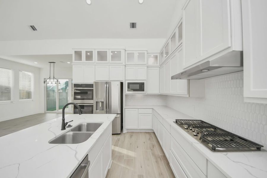 Representative furnished interior of a home built from the Bonneville by Chesmar Homes in Meridiana 50's and 60's, Manvel (Image 11).