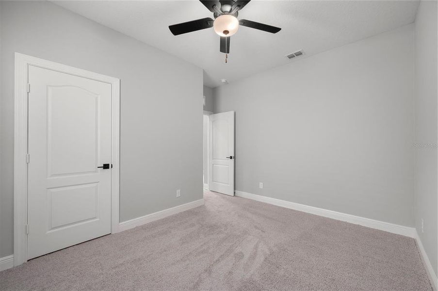 Spacious, unfurnished interior of a new home in Gum Lake Preserve, Lake Alfred (Image 15).