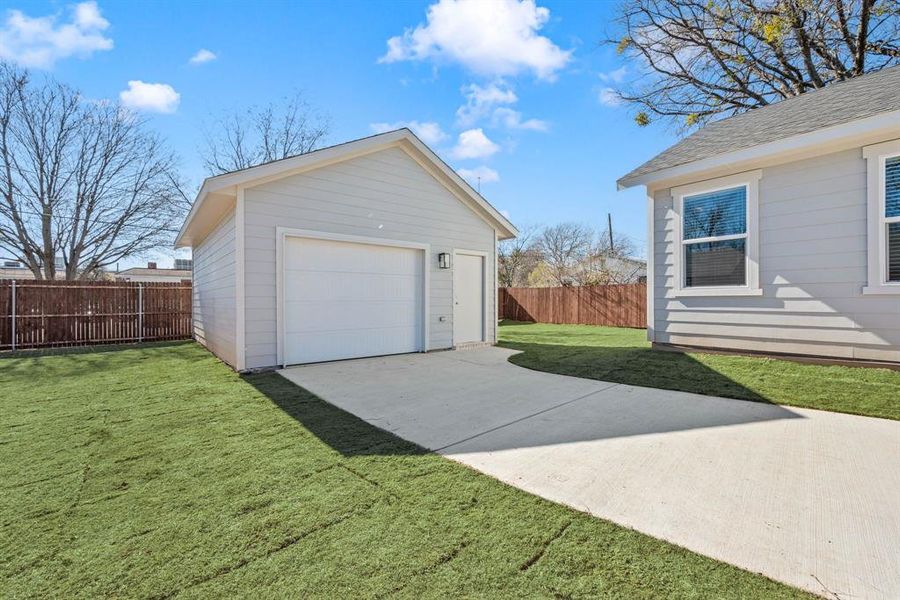 Garage has Insulated Doors and Pedestrian Door