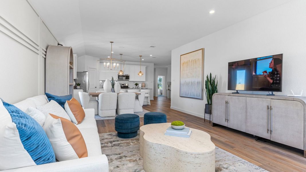 Furnished interior view inside a new home in Caldwell Crossing, Iowa Colony (Image 9).