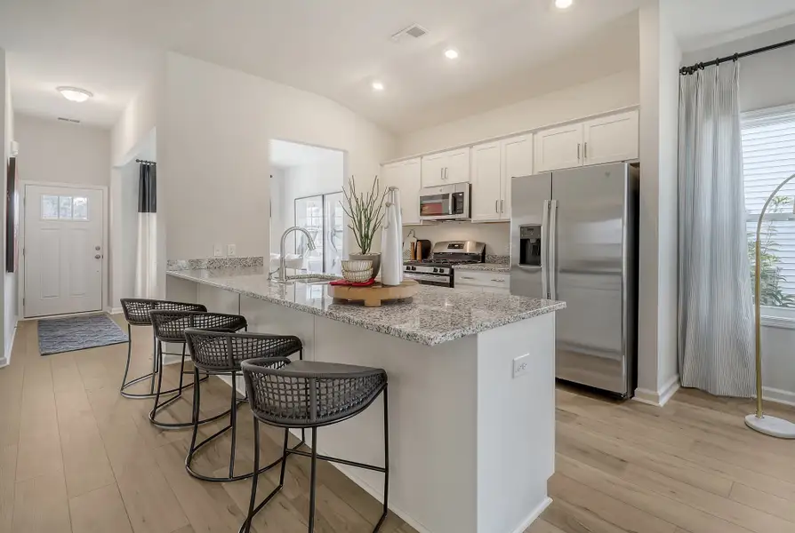 Representative furnished interior of a home built from the Brunswick - Genesis Value Collection by Mungo Homes in Clairmont, Charlotte (Image 3).