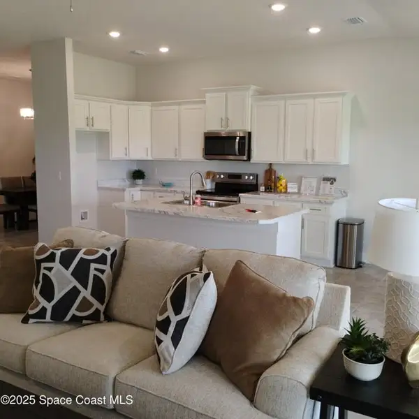 Furnished interior view inside a new home in Courtyard at Waterstone, Palm Bay (Image 5). Furnished interior view inside a new home in Courtyard at Waterstone, Palm Bay (Image 5).