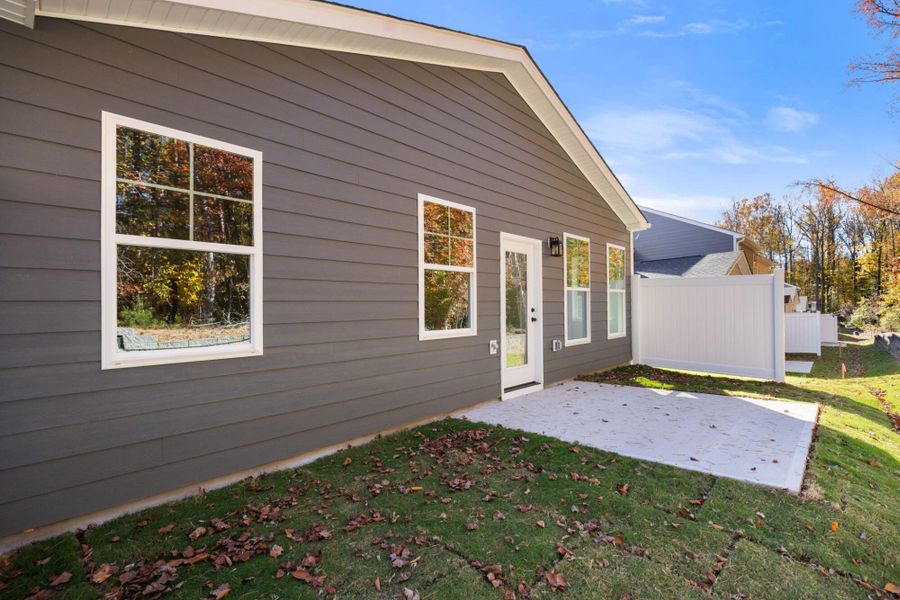 Exterior details and patio area of a home in Harbor Crossing, Greensboro (Image 27).