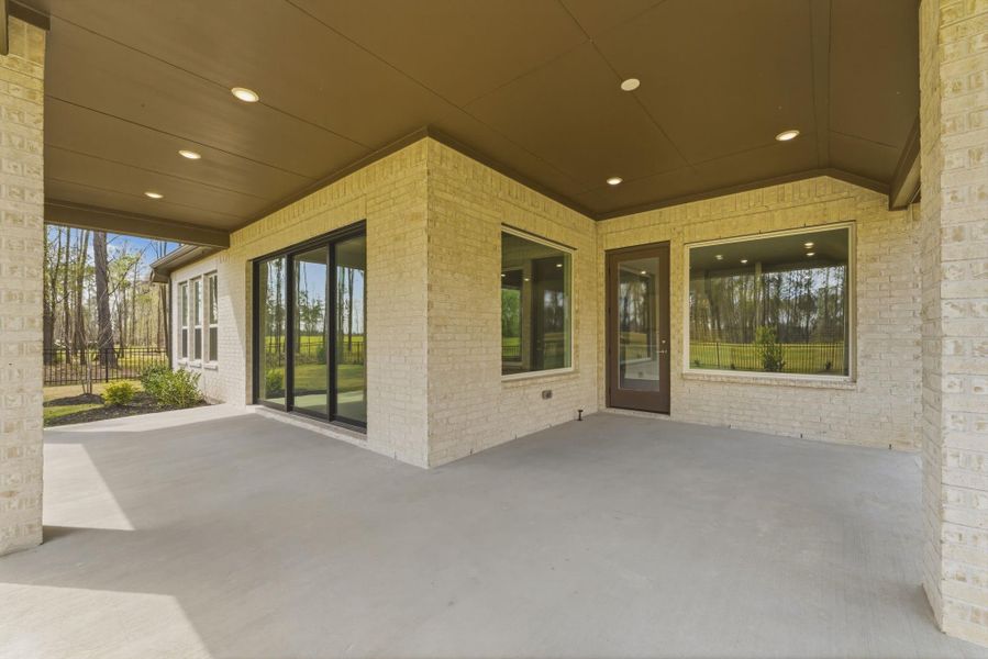Exterior details and patio area of a home in The Highlands, Porter (Image 4).