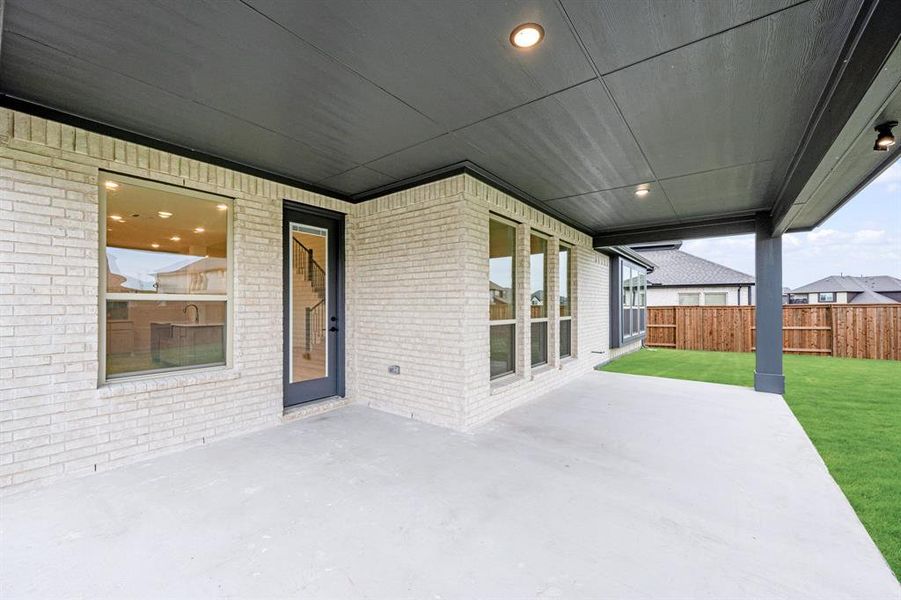 Exterior details and patio area of a home in Windsong Ranch Classic 61, Prosper (Image 3). Exterior details and patio area of a home in Windsong Ranch Classic 61, Prosper (Image 3).