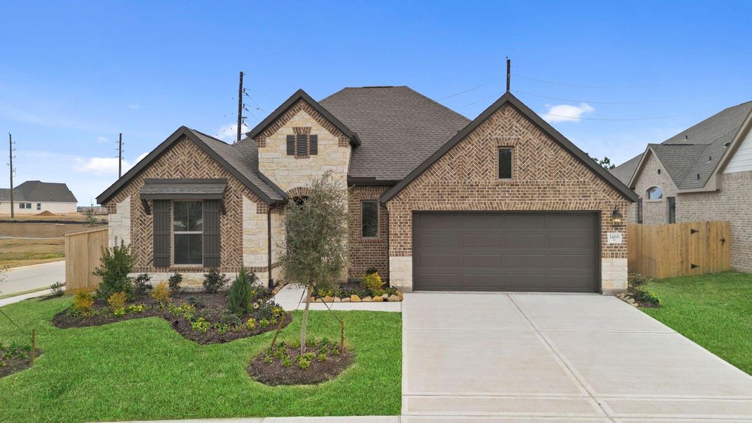 Front exterior of a new home in Escondido, Magnolia, TX, highlighting curb appeal (Image 21). Front exterior of a new home in Escondido, Magnolia, TX, highlighting curb appeal (Image 21).